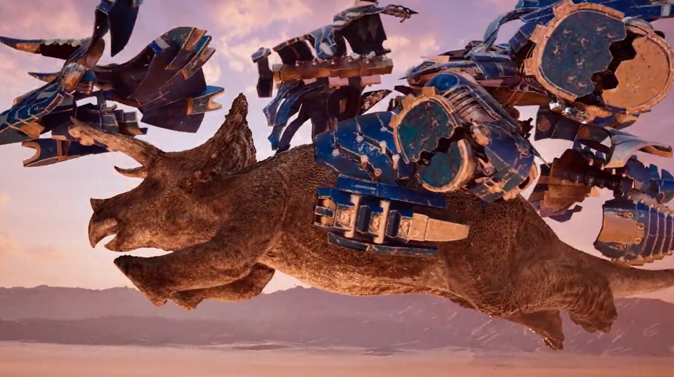 Imagen en la que la nave se va convirtiendo en una armadura azul. Por algún motivo la armadura está muy baqueteada, casi peor que el diseño del triceratops.